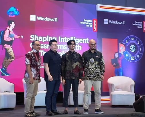 Speakers standing on stage at the Lenovo Indonesia event, in front of the Shaping Intelligent Classrooms with AI Technology backdrop