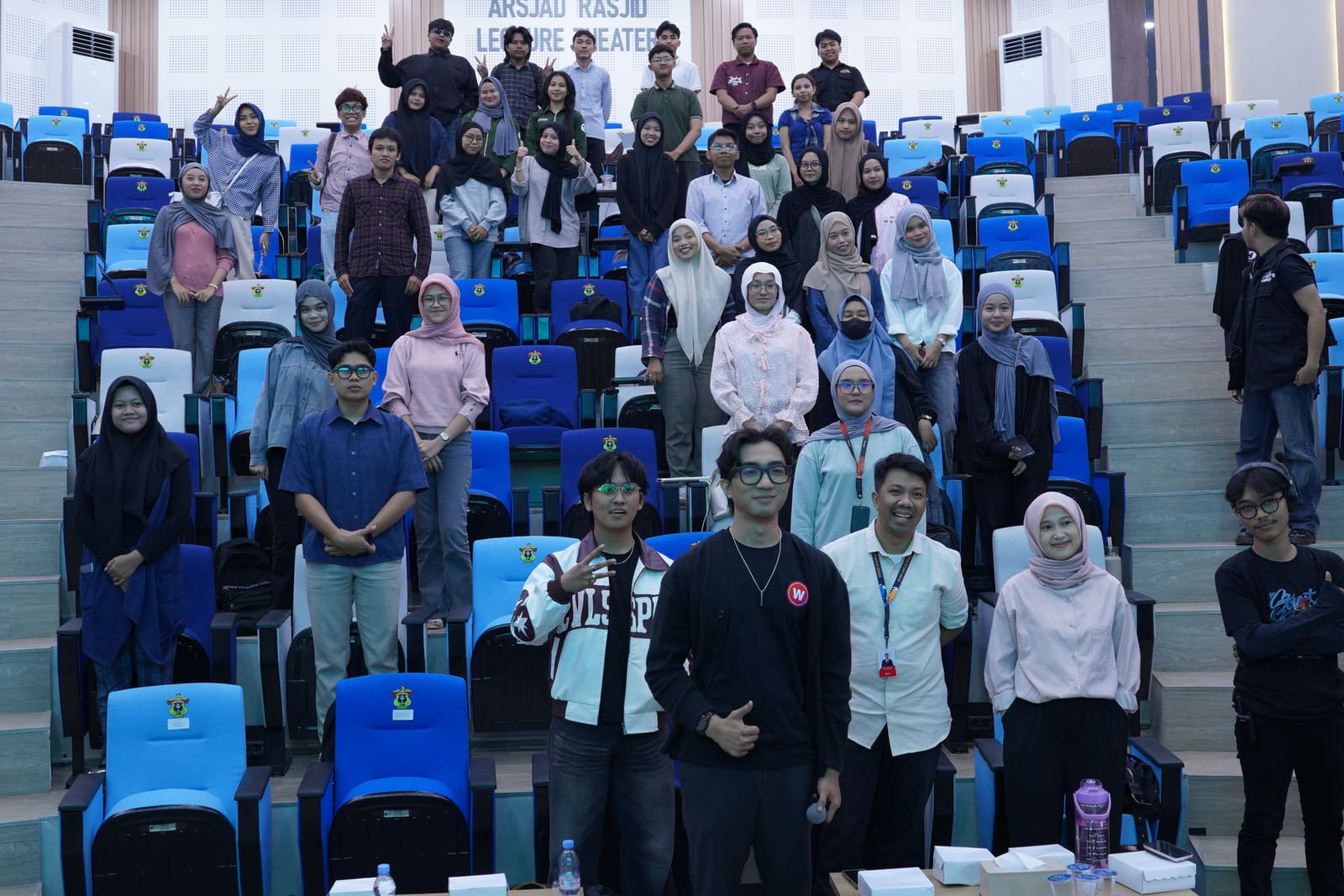 Group photo with student participants in the Arsjad Rasjid Lecture Theatre, Universitas Hasanuddin, after the Campus Community session